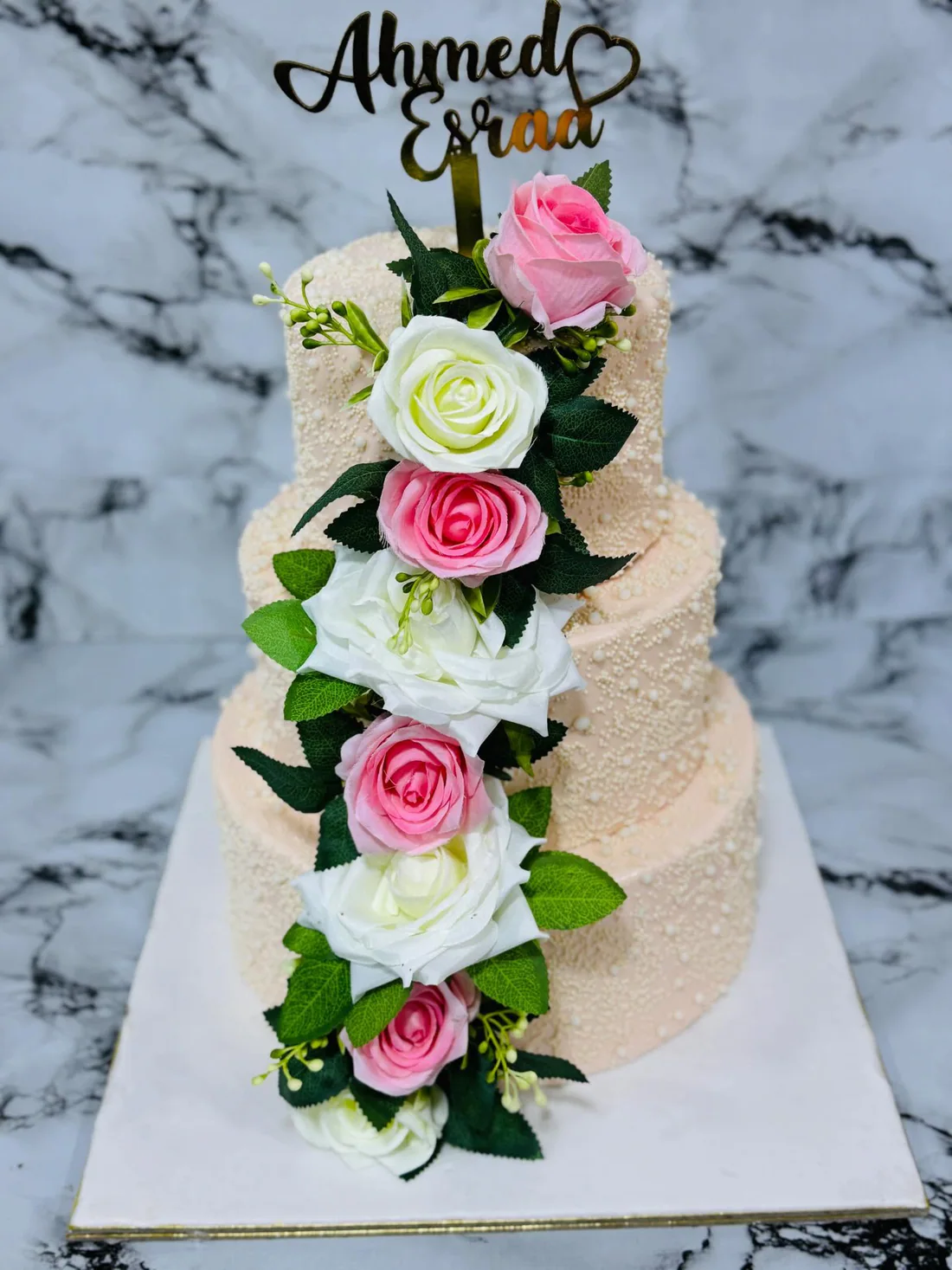 Ivory and blush floral wedding cake