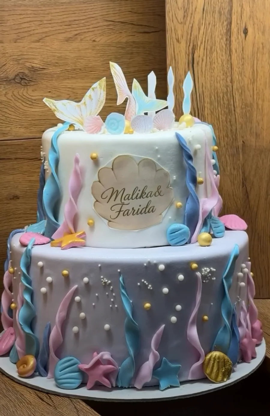Pastel two-tier custom celebration cake